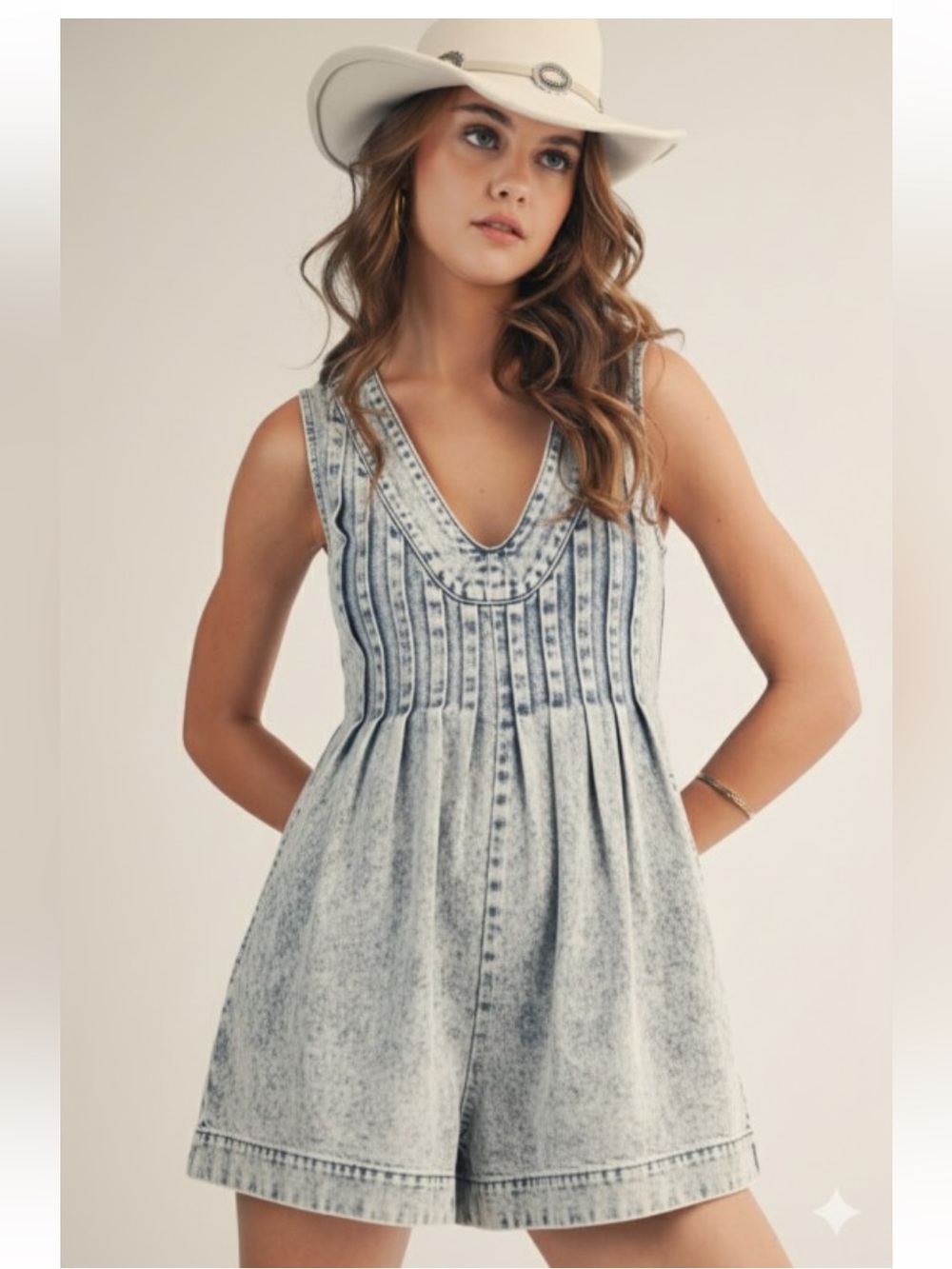2018. Pleated wide leg denim romper by LovLov